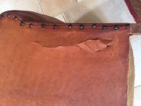 Déchirure arrière fauteuil Club