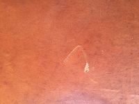 Déchirure arrière fauteuil Club