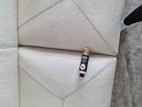 Housse de canapé decolorer sur le cuir