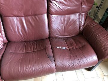 Repair of a torn Stressless chair (red color)