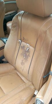 Repair of torn leather vehicle seat - 1
