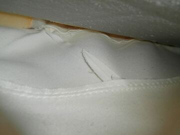doubt one on a leather or imitation leather sofa - 3