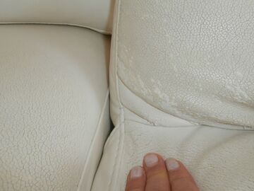 doubt one on a leather or imitation leather sofa - 8