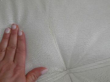 doubt one on a leather or imitation leather sofa - 10