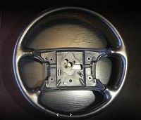 très satisfait de la rénovation de mon volant en cuir et de mon siège