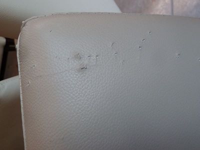 renovation of the armchair following cat scratches