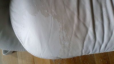 white leather sofa that peels straight away