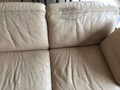 repair swann leather sofa in hugue chevalier style