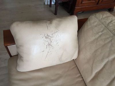 repair swann leather sofa in hugue chevalier style