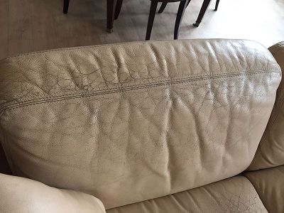 repair swann leather sofa in hugue chevalier style