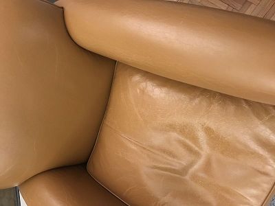 club chair badly restored to be taken up again