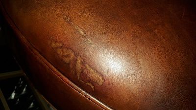 repair a leather armchair damaged by alcohol
