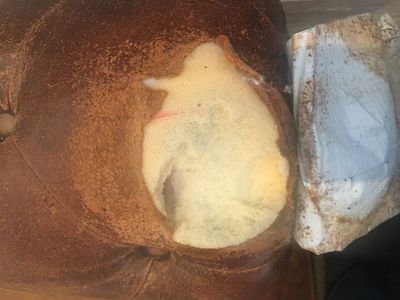 very torn leather repair