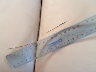 repair armchair in cream leather