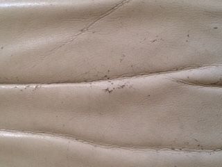 repair armchair in cream leather