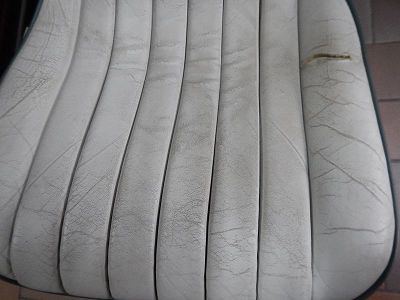 tearing on a nissan figaro seat