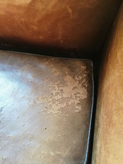 Restauration fauteuil club en cuir