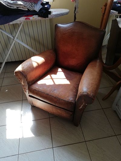Restauration fauteuil club en cuir