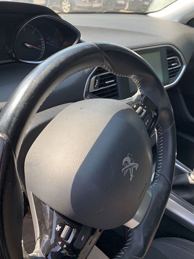 Volant cuir peugeot 308 usé