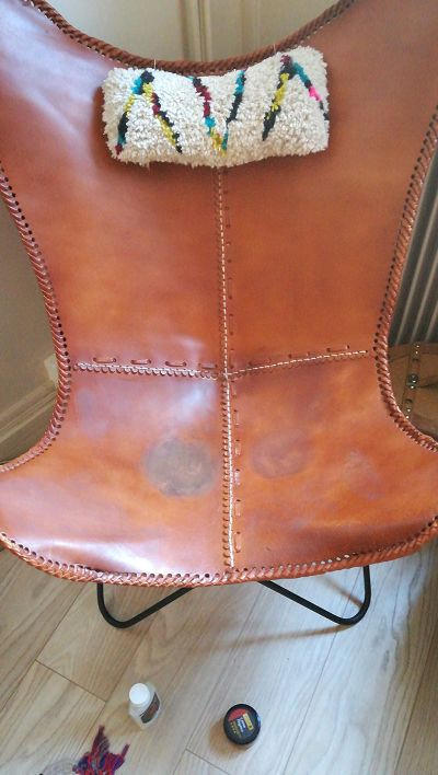 Fauteuil cuir décoloré/tâché