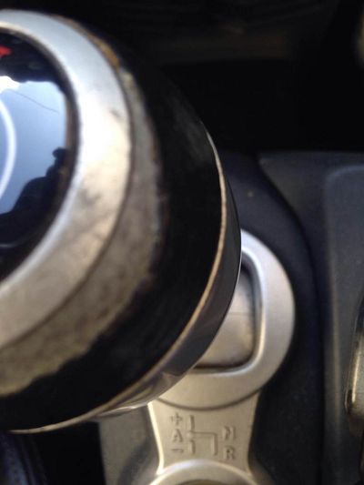 pommeau alu recouvert de cuir