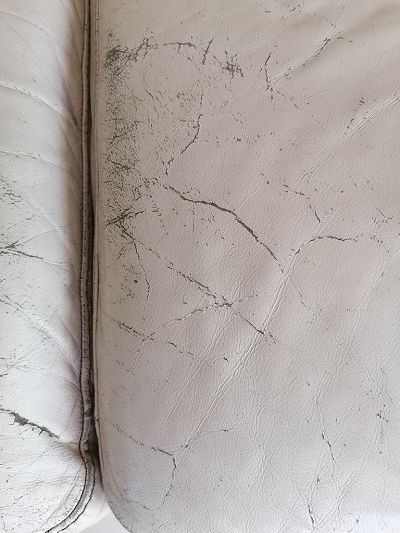 Rénovation salon en cuir beige.