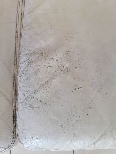 Rénovation salon en cuir beige.