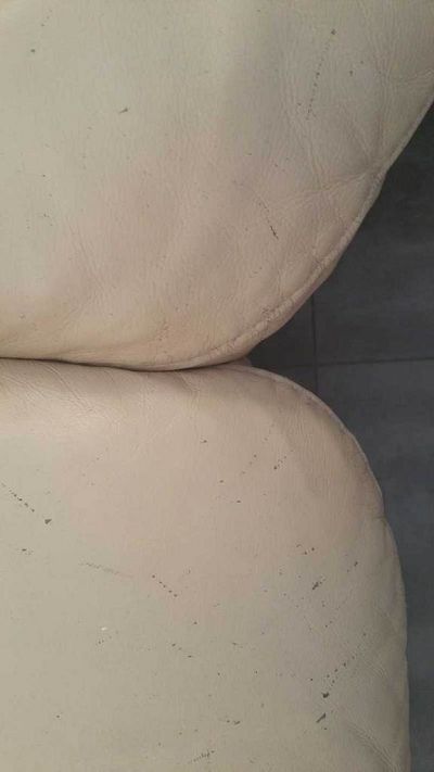 rénovation d'un canapé cinq places en skaï.