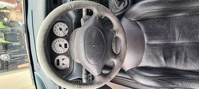 Rénovation volant cuir.