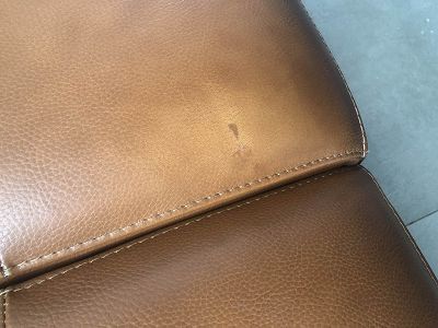 Tache colle sur canapé cuir