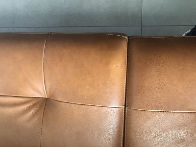 Tache colle sur canapé cuir