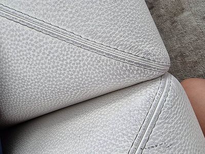 Housse de canapé decolorer sur le cuir