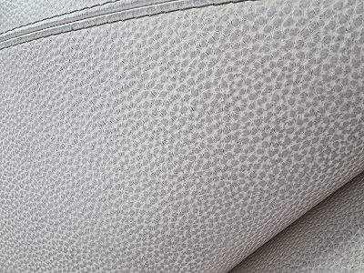 Housse de canapé decolorer sur le cuir