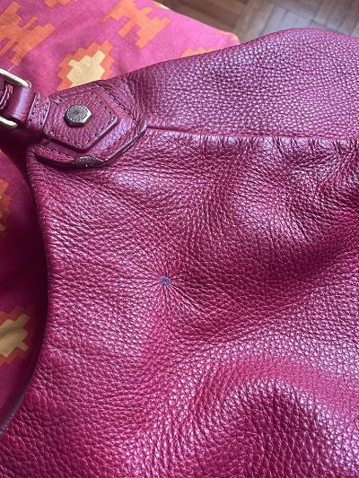 brulure cigarette sur sac