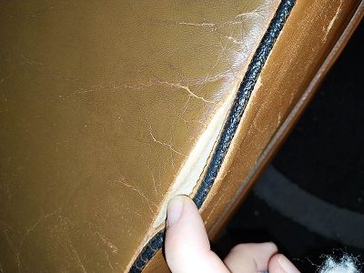 Déchirure fauteuil club