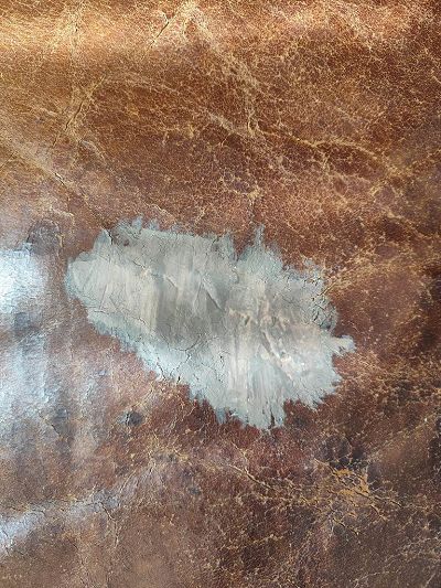 Finitions après reparation d'une déchirures