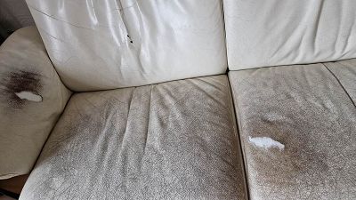 Réparation canapé cuir déchiré par mon lapin