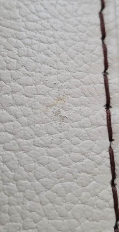 Fauteuil cuir Gorini abîmé