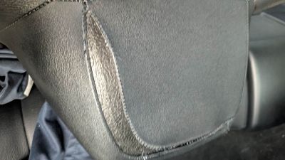 Recoudre appui tête cuir