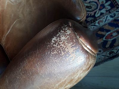 Rénovation craquelures fauteuil club